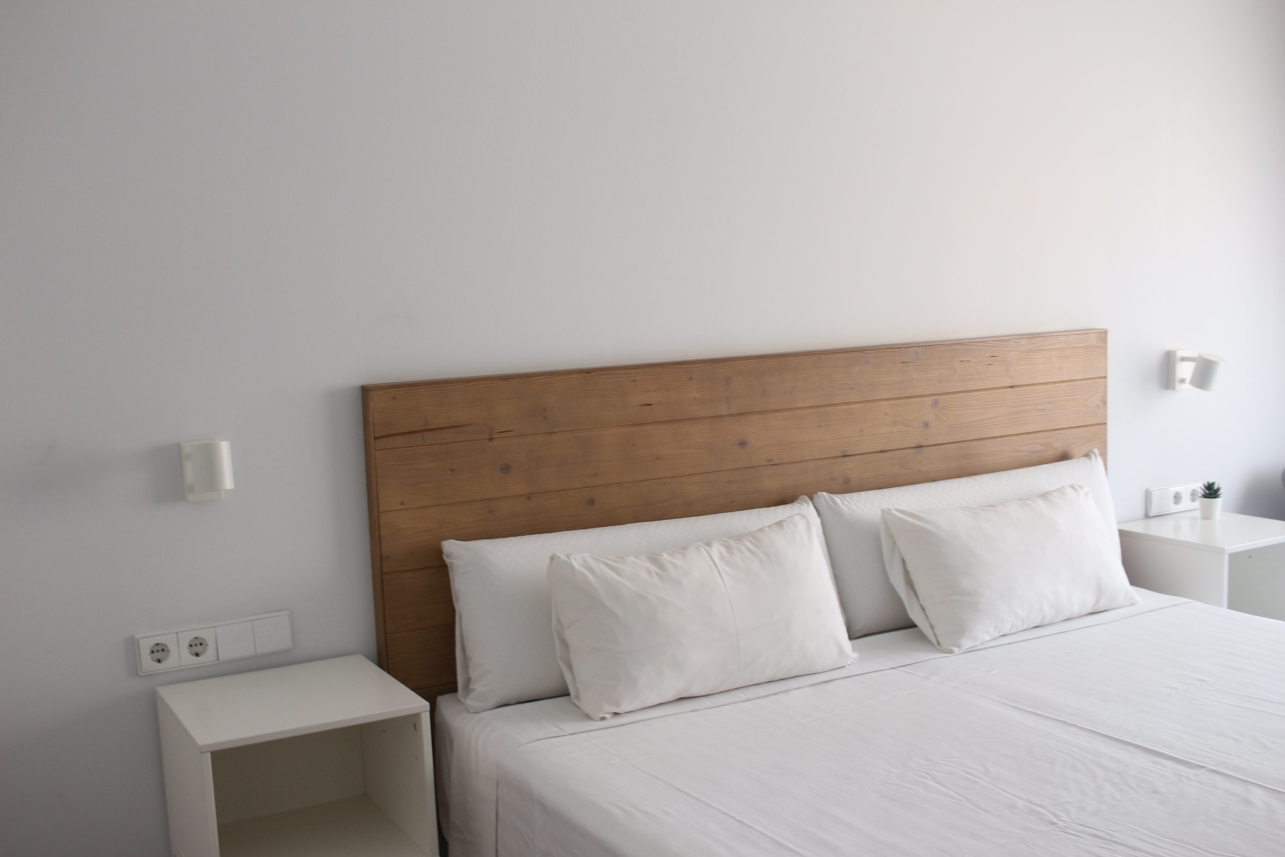 bed with white sheets