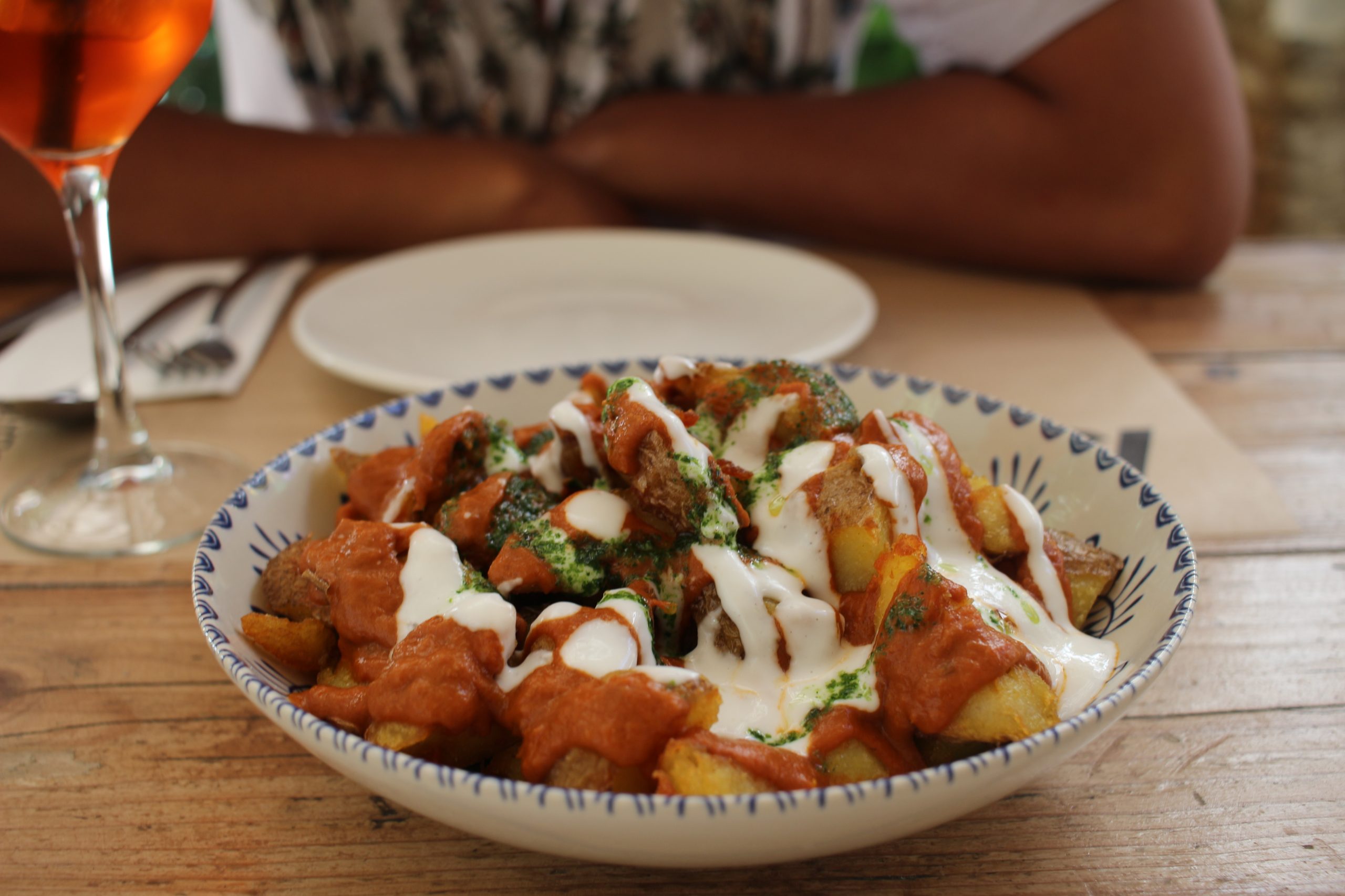 patatas bravas in a bowl