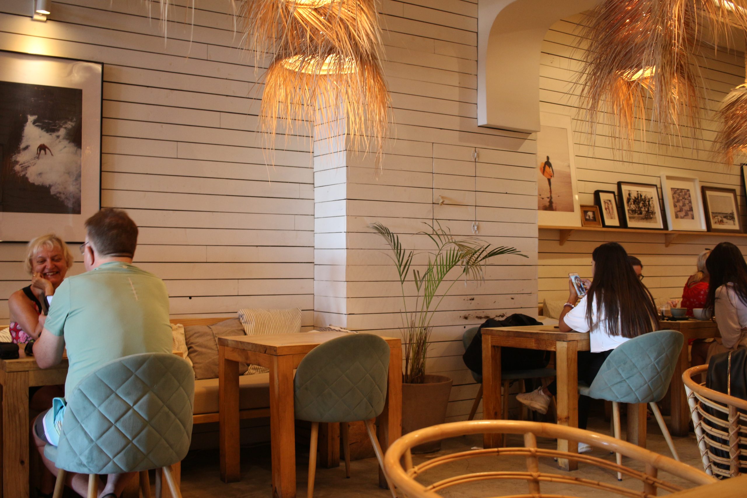 people sitting at Boa Beach Cafe
